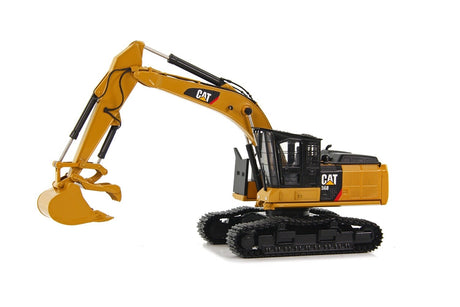 Caterpillar 568GF Road Builder w/Thumb