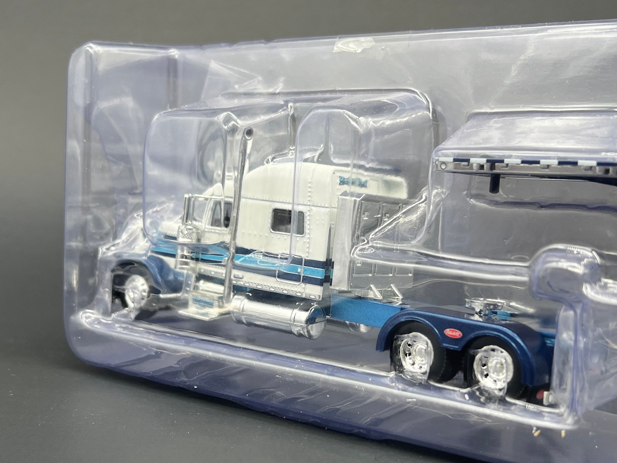 1/64 Scale Peterbilt 389 w/ Flatbed Trailer - McKinney and Sons