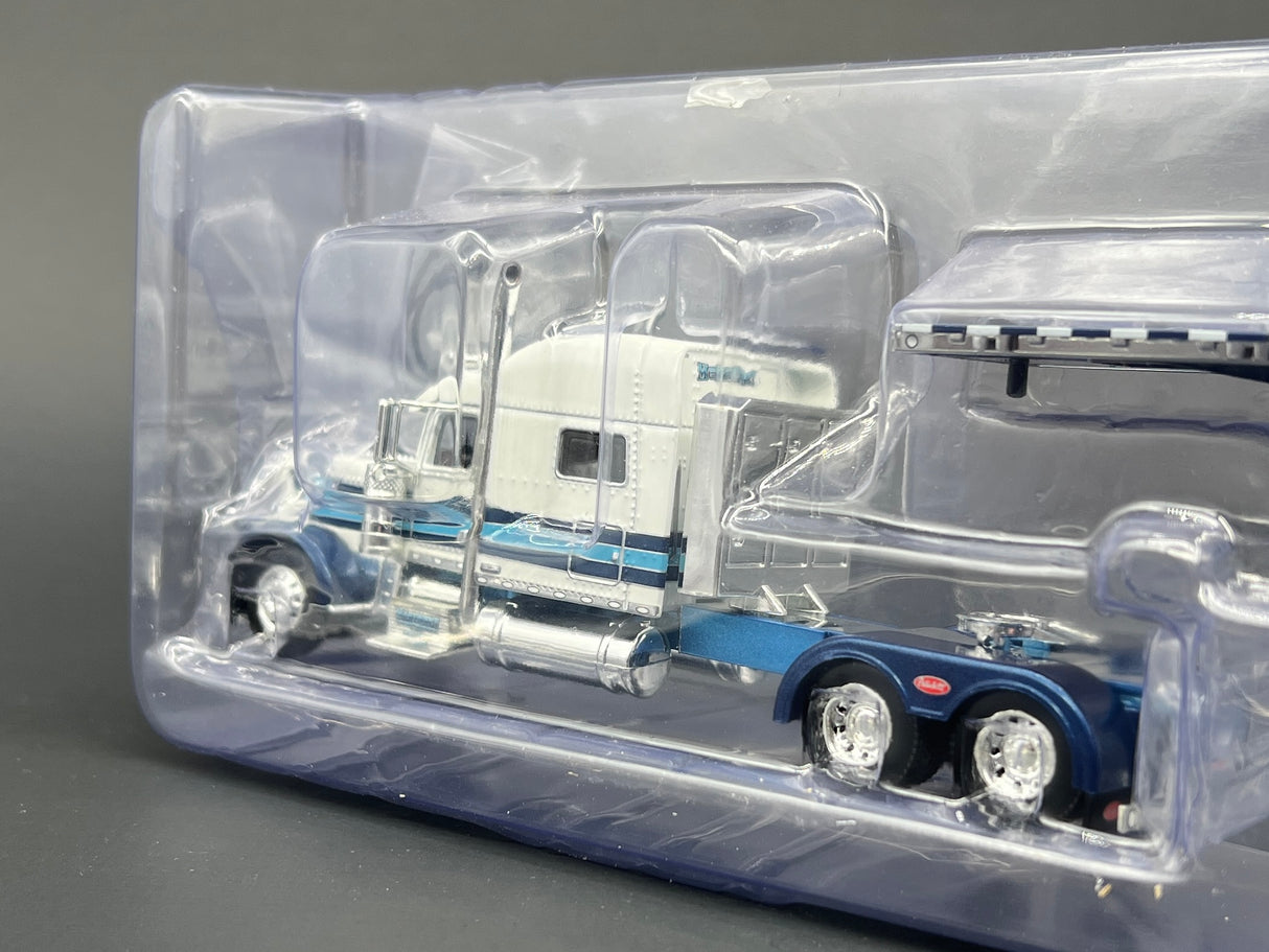 1/64 Scale Peterbilt 389  w/ Flatbed Trailer - McKinney and Sons Transfer DCP 60-1038