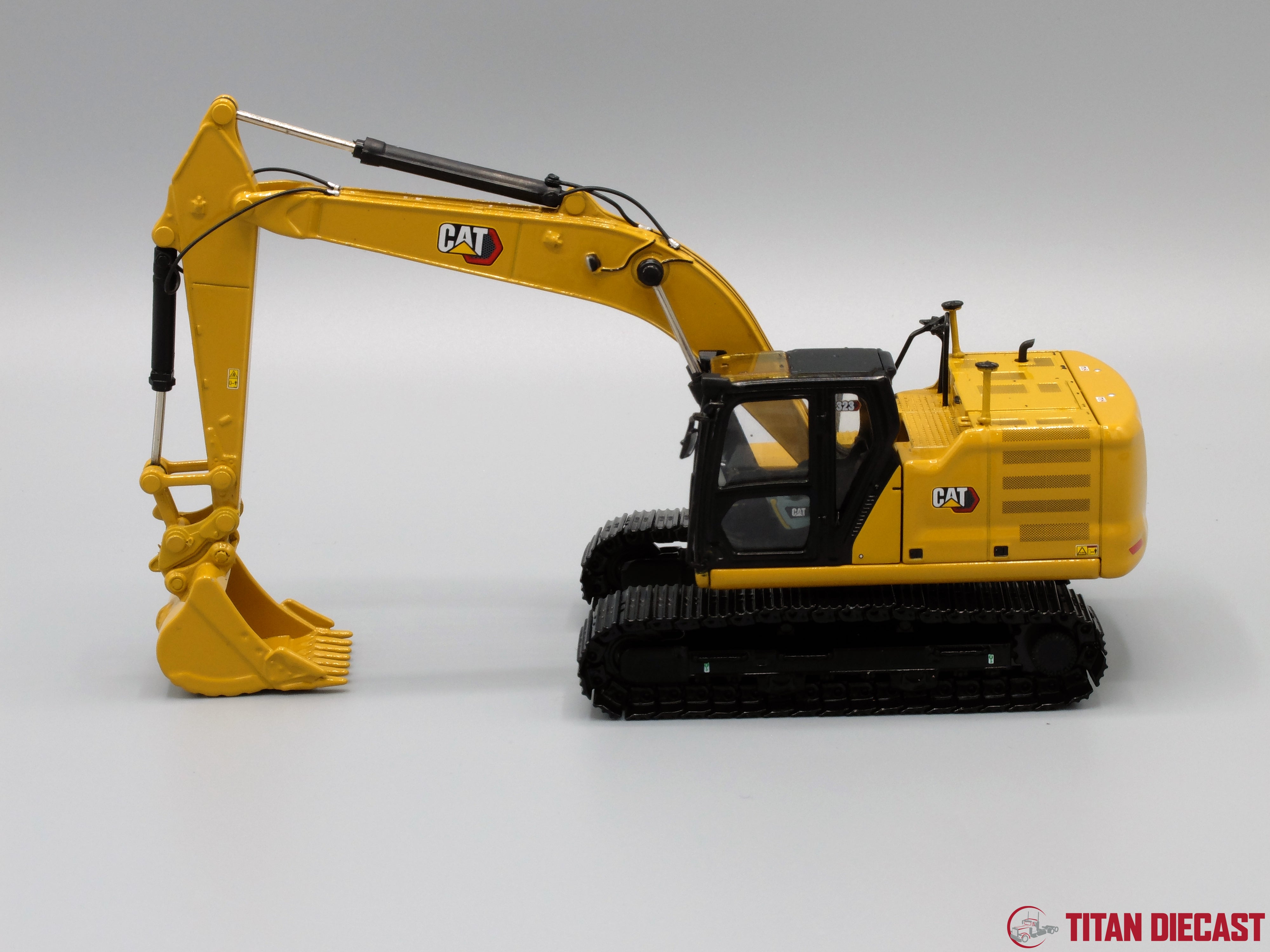 1/50 Scale Cat 323 Next Gen Excavator w/ 5 Attachments – Titan